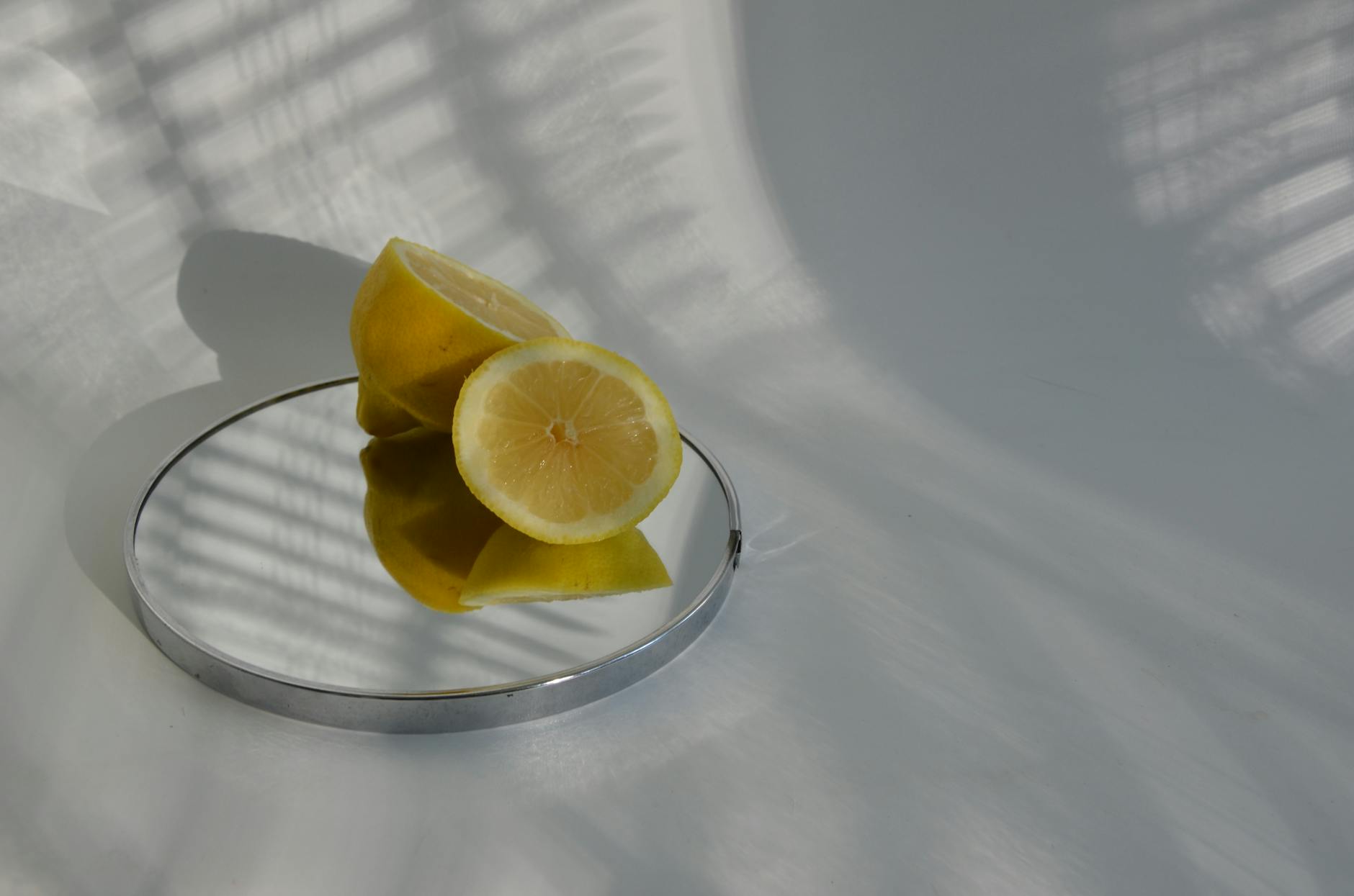 Row of bright ripe lemons on a pastel background, symbolizing natural timing and patience in pleasure