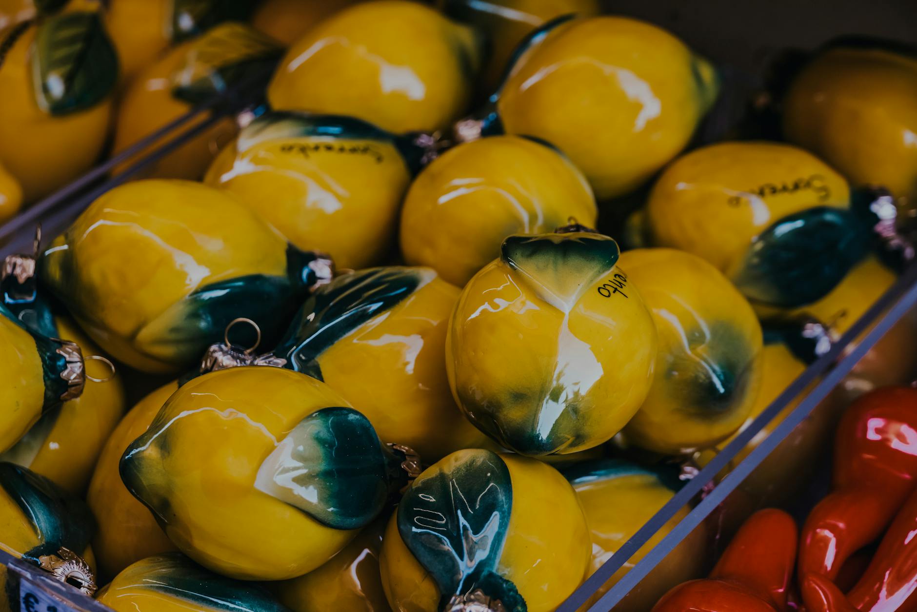 Vibrant yellow ceramic lemons artfully displayed, symbolizing fresh connection and new beginnings.