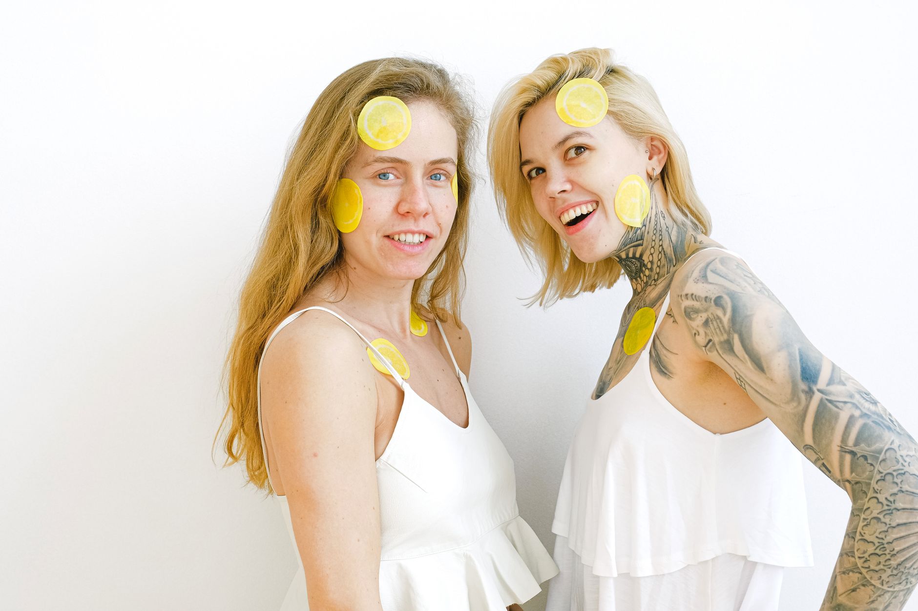 Yellow lemon-shaped vibrator on bright yellow background with creative styling